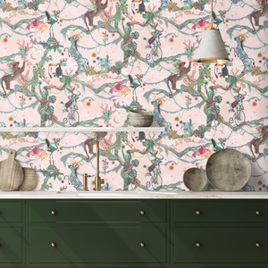 Balancing Act wallpaper by Brand McKenzie in pink, monkeys, toucans and flamingos in vines behind a console table