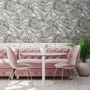 Banana Leaves Max wallpaper by Brand McKenzie in black and white, large banana leaves in a living room