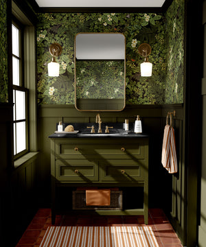 Woodland Floor wallpaper by Studio Le Cocq in dark green, woodland flowers and ferns in a bathroom