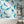 Shoal of Fish wallpaper by Seed Home Designs in blue and green, watercolour fish in a bathroom