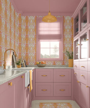 Bel Air Blossom wallpaper by Liberty James Studio in apricot, a mirrored blossom design in a kitchen
