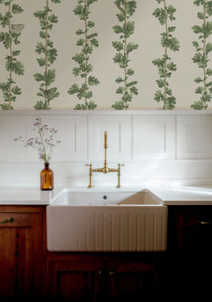 Hawthorn Stripe wallpaper by Studio Le Cocq in gold, trailing hawthorn stripes in a kitchen