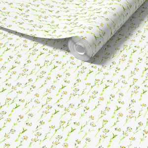 Betsy wallpaper by Seed Home Designs in yellow and green, roll showing delicate ditsy flowers