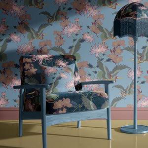 Blossom Sky wallpaper by Tatie Lou in blue, blossoms and birds in a living room