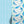Shoal of Fish wallpaper by Seed Home Designs in blue and green, roll showing watercolour fish