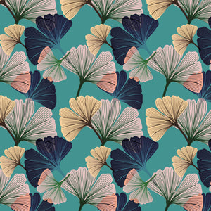 Ginkgo wallpaper by Tatie Lou in blue, partly unrolled roll showing oversized ginkgo leaves