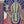 Blues Fantasia wallpaper by The Monkey Puzzle Tree in blue and red, pattern sample of an art deco musician motif