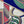 Blues Fantasia wallpaper by The Monkey Puzzle Tree in blue and red, close-up of an art deco musician motif