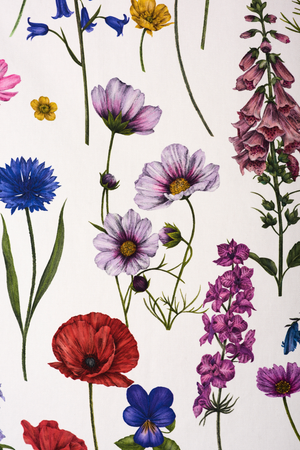 Botanica fabric by Victoria Sanders in white, full repeat of wildflowers and poppies