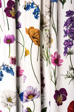 Botanica fabric by Victoria Sanders in white, wildflowers and poppies as lined curtains