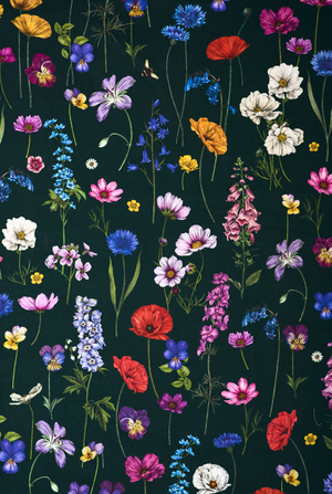 Botanica velvet by Victoria Sanders in green, wildflowers and poppies made into curtains