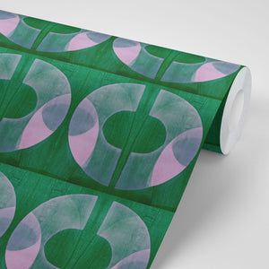 Boucle wallpaper by Tatie Lou in green, roll showing bold retro rings