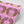 Boucle wallpaper by Tatie Lou in pink, flat sample of bold retro rings