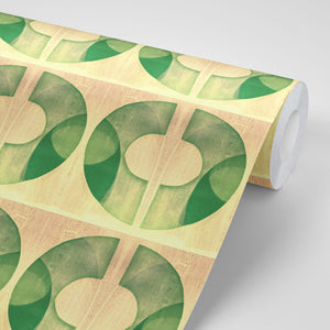 Boucle wallpaper by Tatie Lou in yellow, partly unrolled roll showing bold retro rings