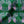 Boucle velvet by Tatie Lou in green, draped, showing bold retro rings