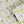Bumblebee and Flora wallpaper by Seed Home Designs in yellow and green, roll showing bumblebees and sunflowers