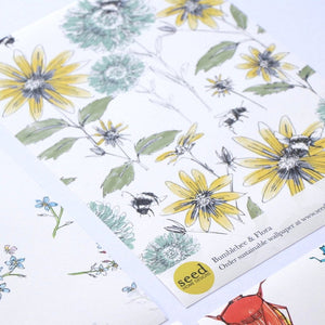 Bumblebee and Flora wallpaper by Seed Home Designs in yellow and green, full repeat of bumblebees and sunflowers