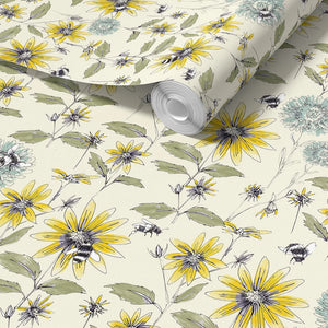 Bumblebee and Flora wallpaper by Seed Home Designs in cream, partly unrolled roll showing bumblebees and sunflowers