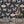 Butterfly Effect wallpaper by Brand McKenzie in black, butterflies and moths on a bedroom wall