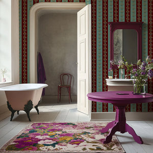Chateau Stripe wallpaper by Tatie Lou in red and blue, floral stripes in a bathroom