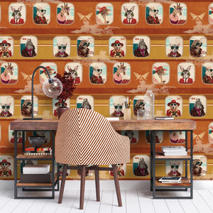 Cabin Class wallpaper by Brand McKenzie in orange, animal passengers in train windows in a home office