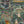 Carnival Map wallpaper by Brand McKenzie in teal, pattern detail of an illustrated carnival map