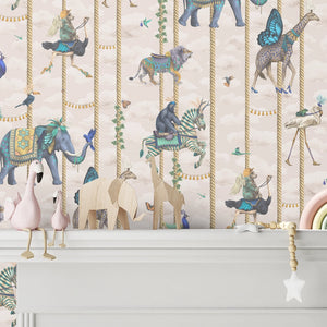 Carousel wallpaper by Brand McKenzie in cream, carousel animals on poles above a white mantelpiece