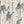 Carousel wallpaper by Brand McKenzie in cream, close-up of carousel animals on poles