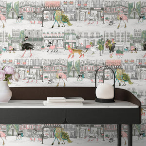 Catwalk wallpaper by Brand McKenzie in black and white, animals parading down a city street behind a desk in a home office