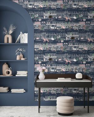 Catwalk wallpaper by Brand McKenzie in blue, animals parading down a city street behind a desk in a home office