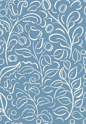 Celeste linen by Claire de Quénetain in blue, in soft folds showing swirling leaf scrolls