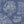 Charming Lanes wallpaper by Brand McKenzie in blue, toile-style townhouses behind a bed