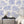Charming Lanes wallpaper by Brand McKenzie in blue, close-up of toile-style townhouses (alternate view)