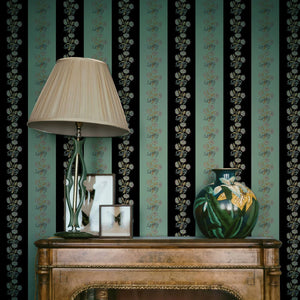 Chateau Stripe wallpaper by Tatie Lou in black and mint green, floral stripes above a sideboard