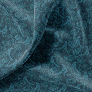 Chattering of Choughs velvet by Annika Reed in teal, draped, showing choughs among leaves