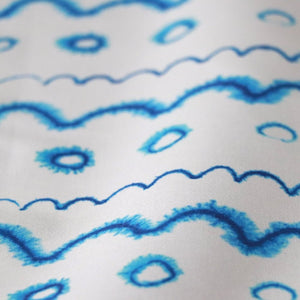 Circles in the Waves linen by Seed Home Designs in blue and white, flat sample (alternate view)
