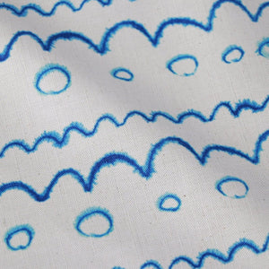 Circles in the Waves linen by Seed Home Designs in blue and white, pattern sample of watercolour circles and waves