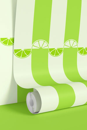 Citrus wallpaper by Liberty James Studio in lime green, partly unrolled roll showing wide stripes