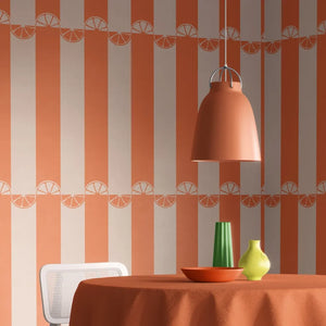 Citrus wallpaper by Liberty James Studio in orange, wide stripes in a dining area