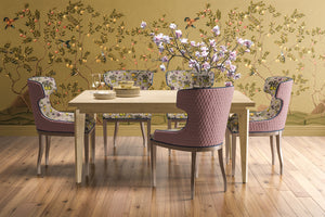 Citrus Trees wallpaper by Dami and Em Design in beige, citrus trees in a dining area