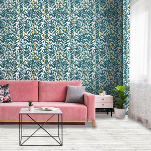 Climbing Vine wallpaper by Annika Reed in teal and yellow, climbing vines behind a sofa in a living room