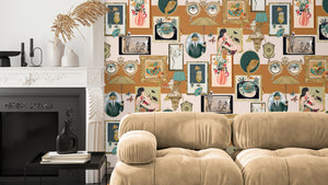 Connecting Frames wallpaper by Brand McKenzie in caramel, a gallery wall of framed portraits on a living room wall