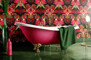 Coral Gables wallpaper by Liberty James Studio in pink, red and green, a bold mirrored floral in a bathroom