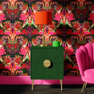 Coral Gables wallpaper by Liberty James Studio in pink, red and green, a bold mirrored floral above a sideboard