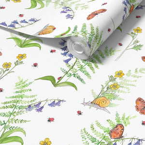 Cornish Woodland wallpaper by Seed Home Designs in green and orange, roll showing woodland flowers and creatures