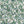 Creeping Trellis wallpaper by Parker and Jules in green and pink, full repeat of flowers on a trellis