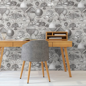 Curious Skies wallpaper by Brand McKenzie in black and white behind a desk in a home office