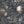 Curious Skies wallpaper by Brand McKenzie in charcoal, pattern detail of hot air balloons and creatures in the clouds