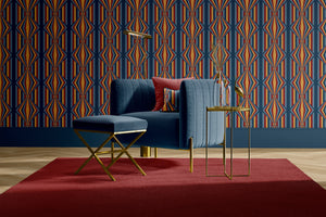 Deco Prism wallpaper by Liberty James Studio in navy and gold, art deco wave stripes in a living room