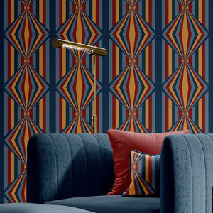 Deco Prism wallpaper by Liberty James Studio in multicolour, art deco wave stripes behind a sofa in a living room